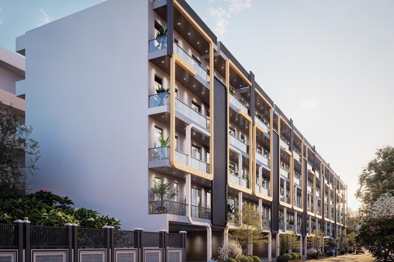 Niharika Buildwell Independent Floors — clean four-storey premium elevation with curved balconies and large windows at M3M City of Dreams, Panipat, Haryana